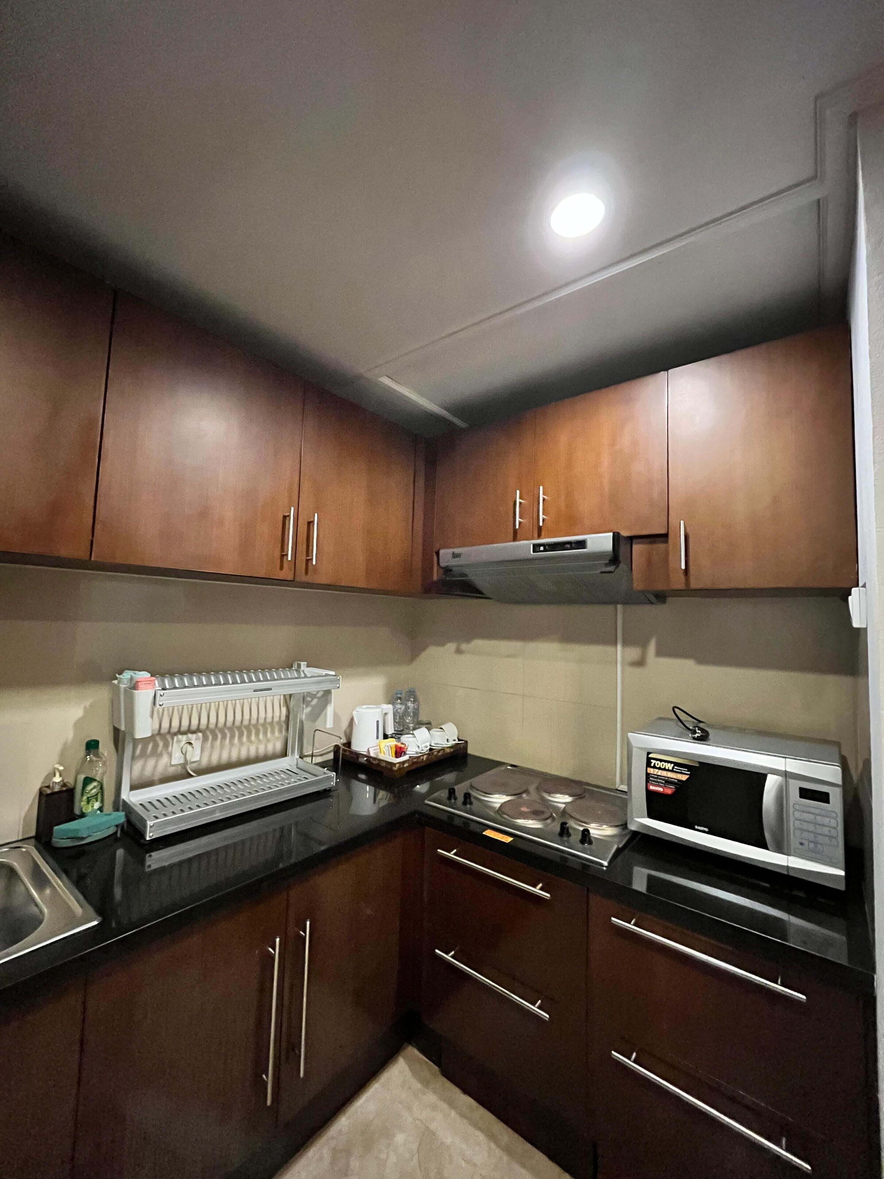 luxury two bedroom residence with pool view and partial ocean view | private kitchen | coffee/tea maker, electric kettle