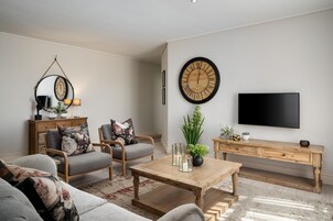 Suite, 1 cama de matrimonio grande | Salón