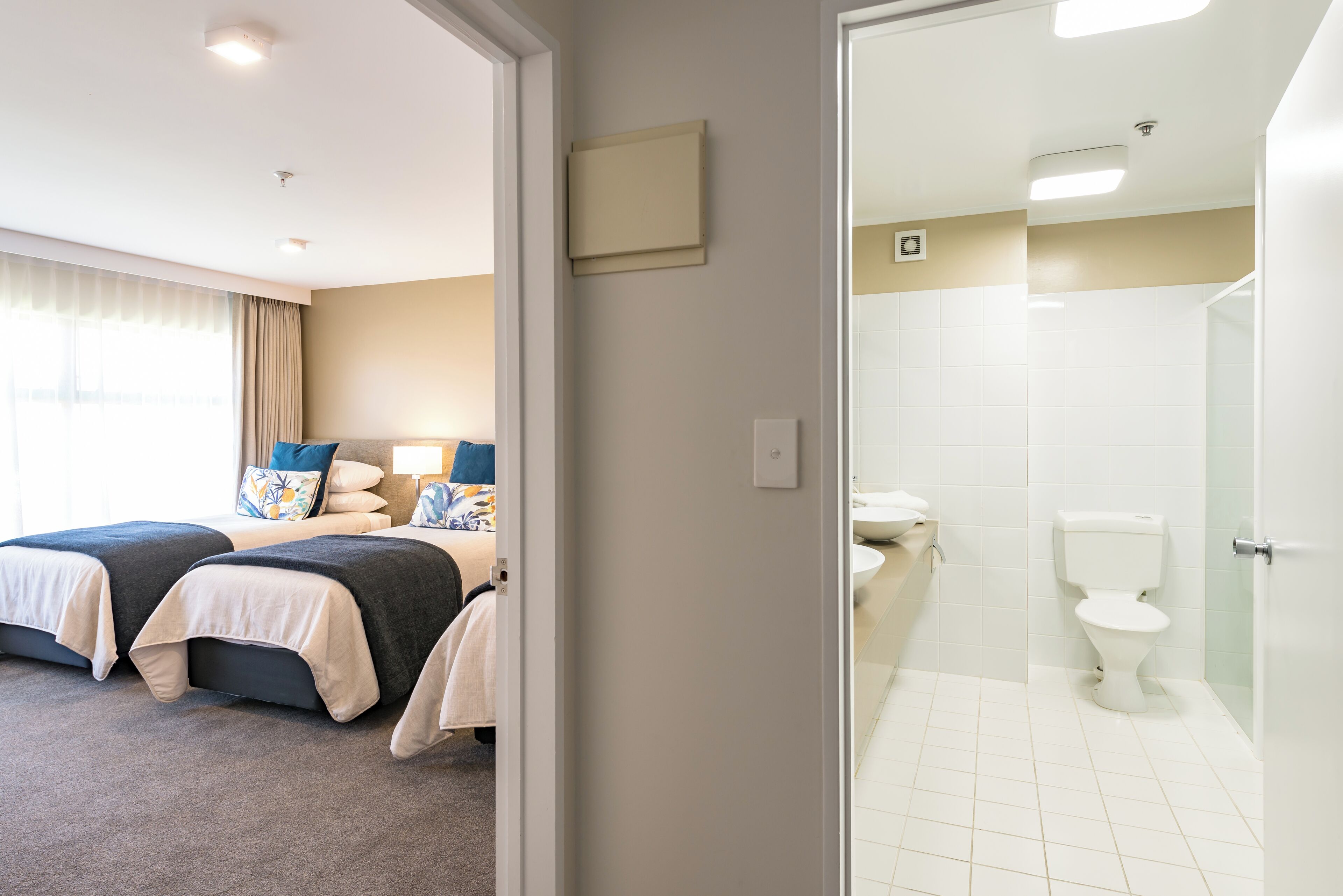 superior family room | desk, blackout curtains, iron/ironing board, free wifi