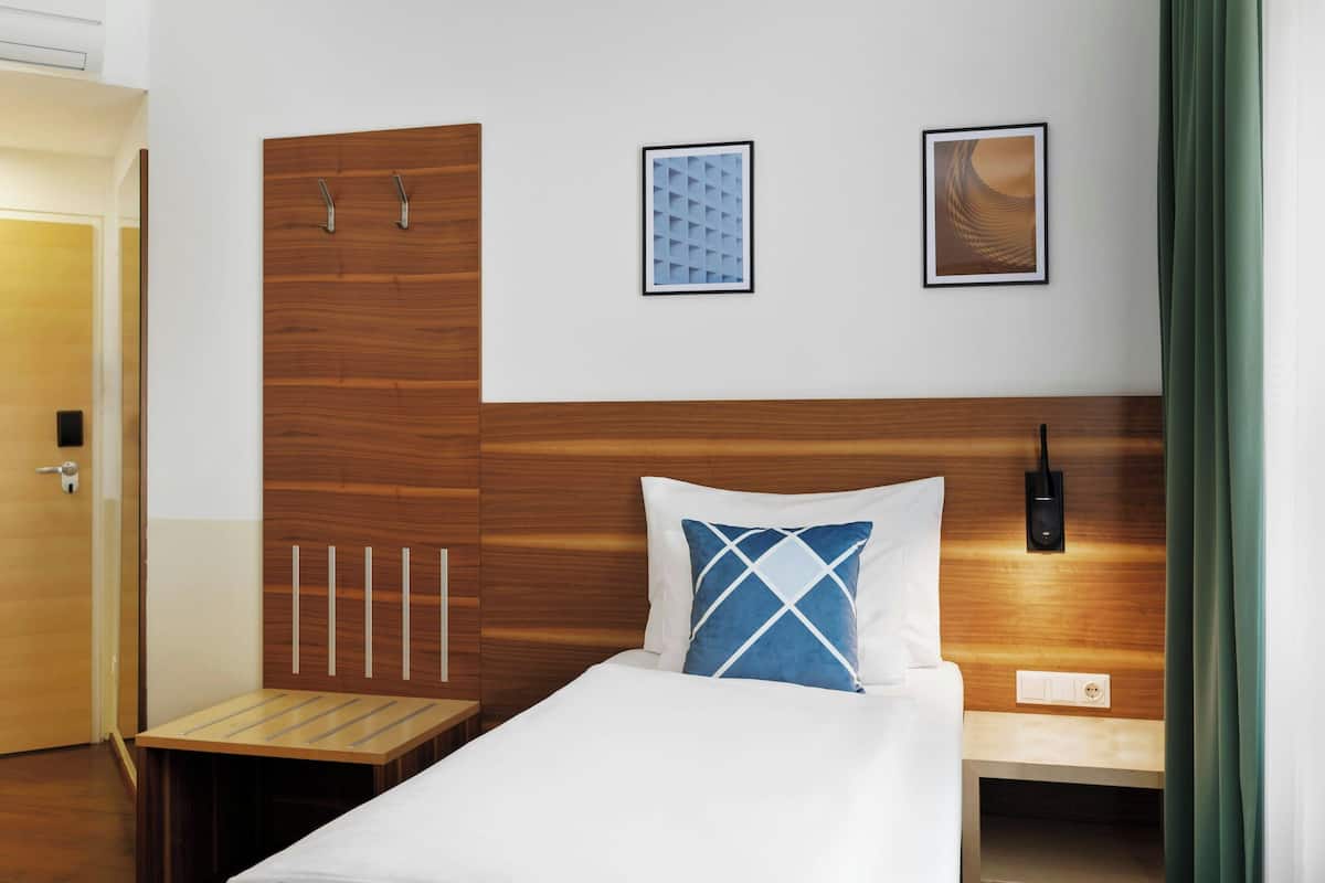 Standard Room, 1 Twin Bed, City View | Minibar, in-room safe, desk, free WiFi