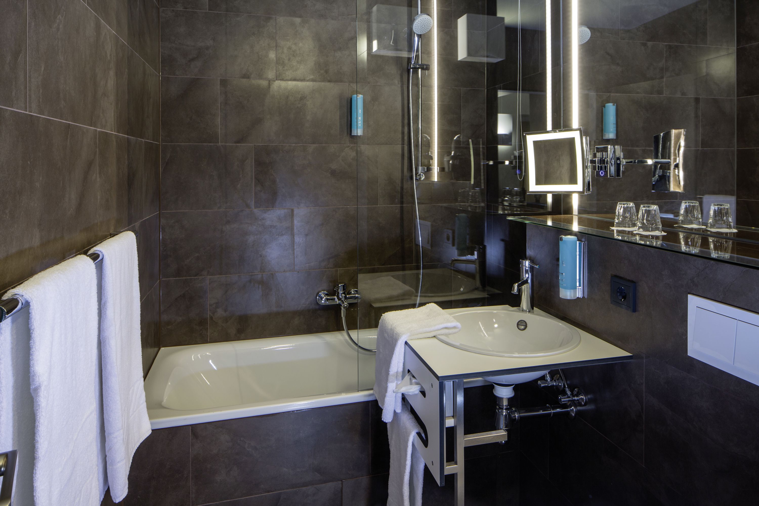 hair dryer, towels, soap, shampoo