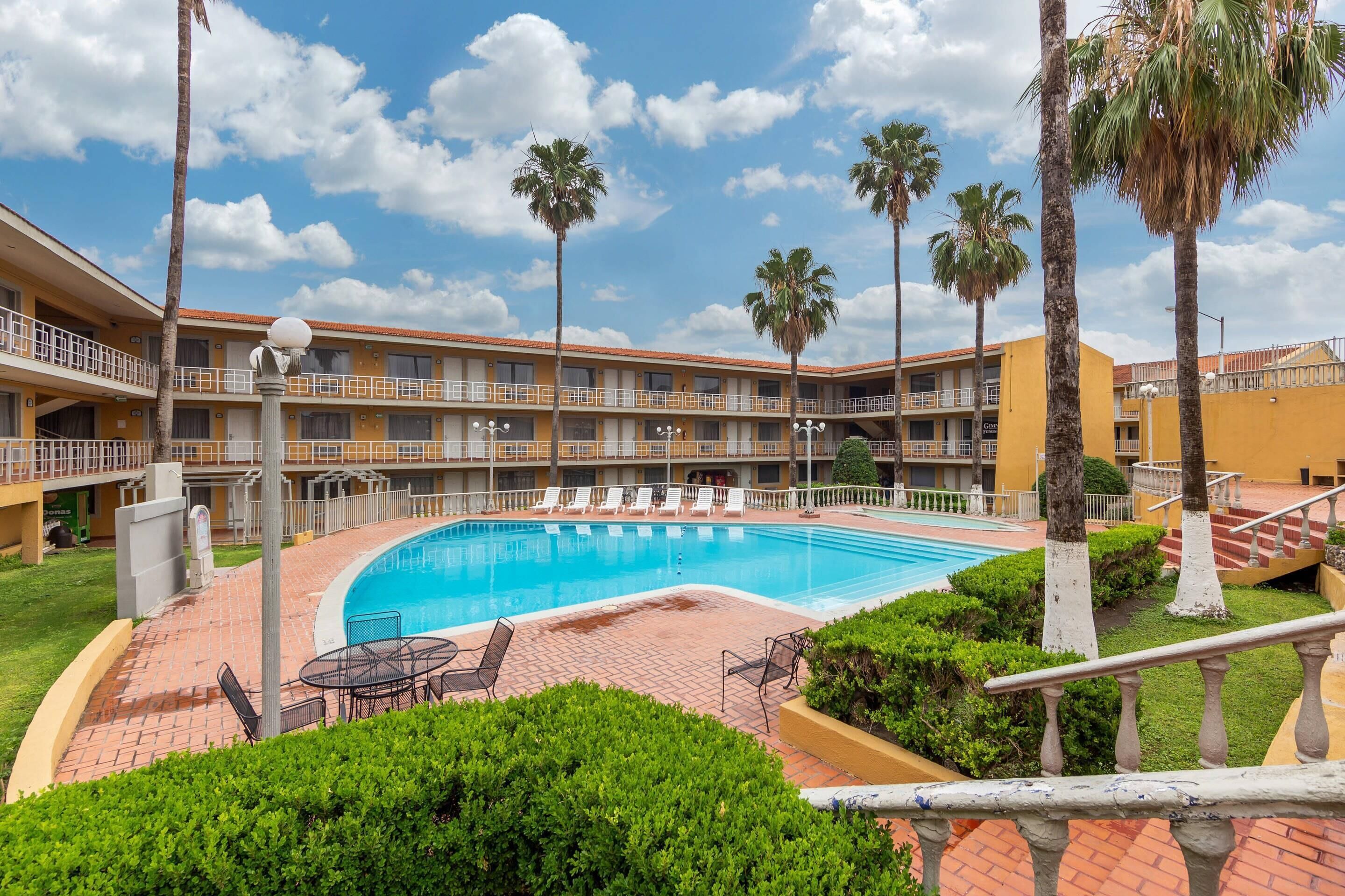 Outdoor pool, open 9:00 AM to 10:00 PM, sun loungers