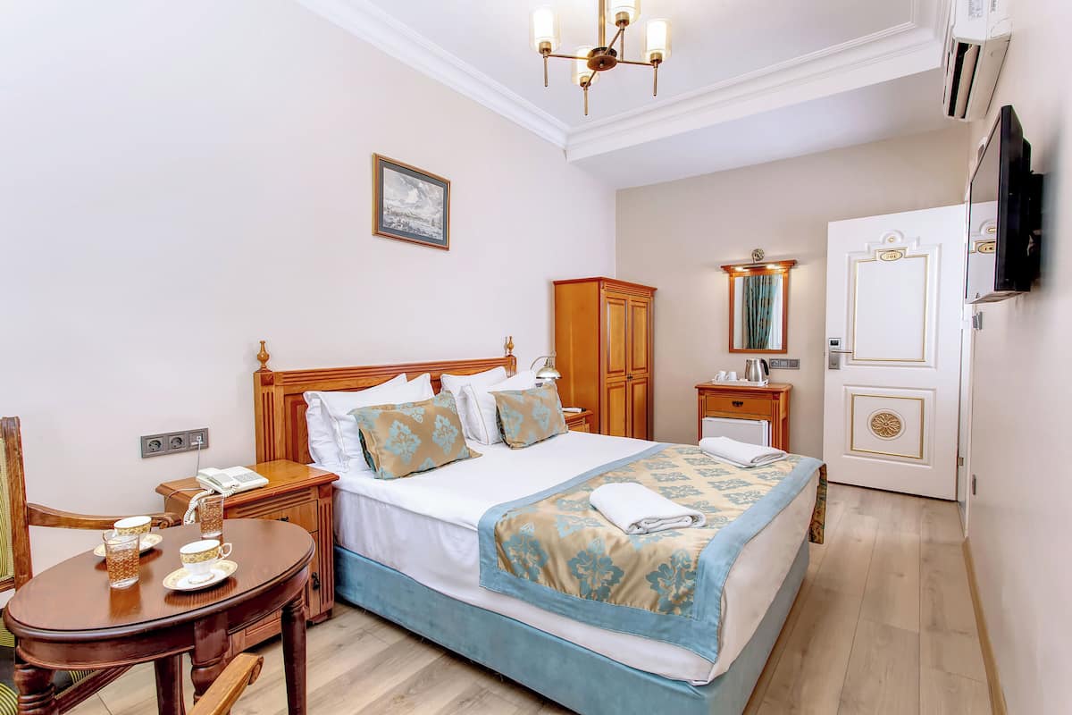 Standard Double Room, 1 Double Bed | Premium bedding, minibar, in-room safe, desk