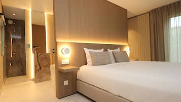 Ropa de cama de alta calidad, colchones Tempur-Pedic, minibar