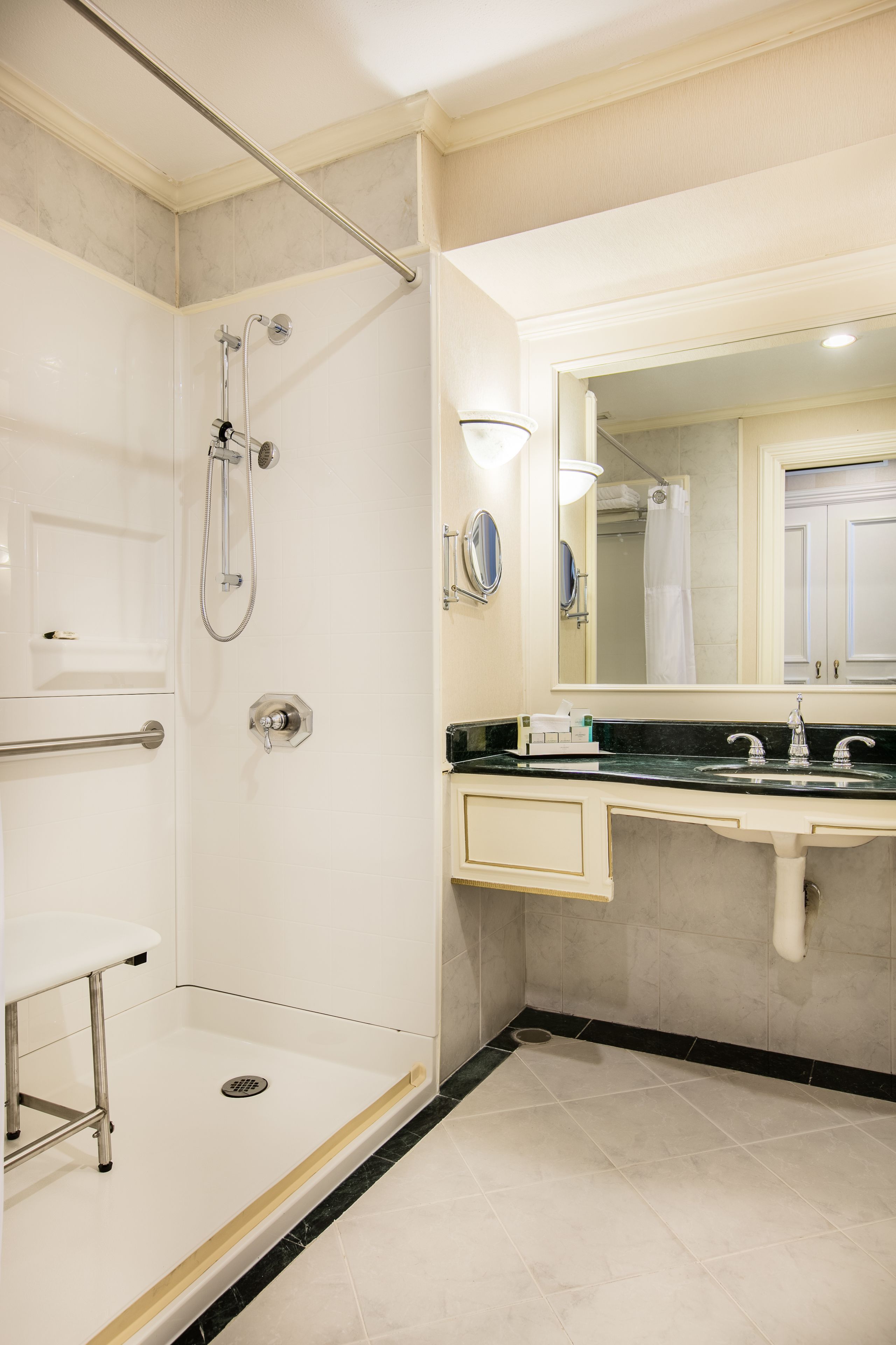 combined shower/bathtub, eco-friendly toiletries, hair dryer, bathrobes