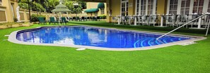 Outdoor pool, open 6:00 AM to 8:00 PM, sun loungers