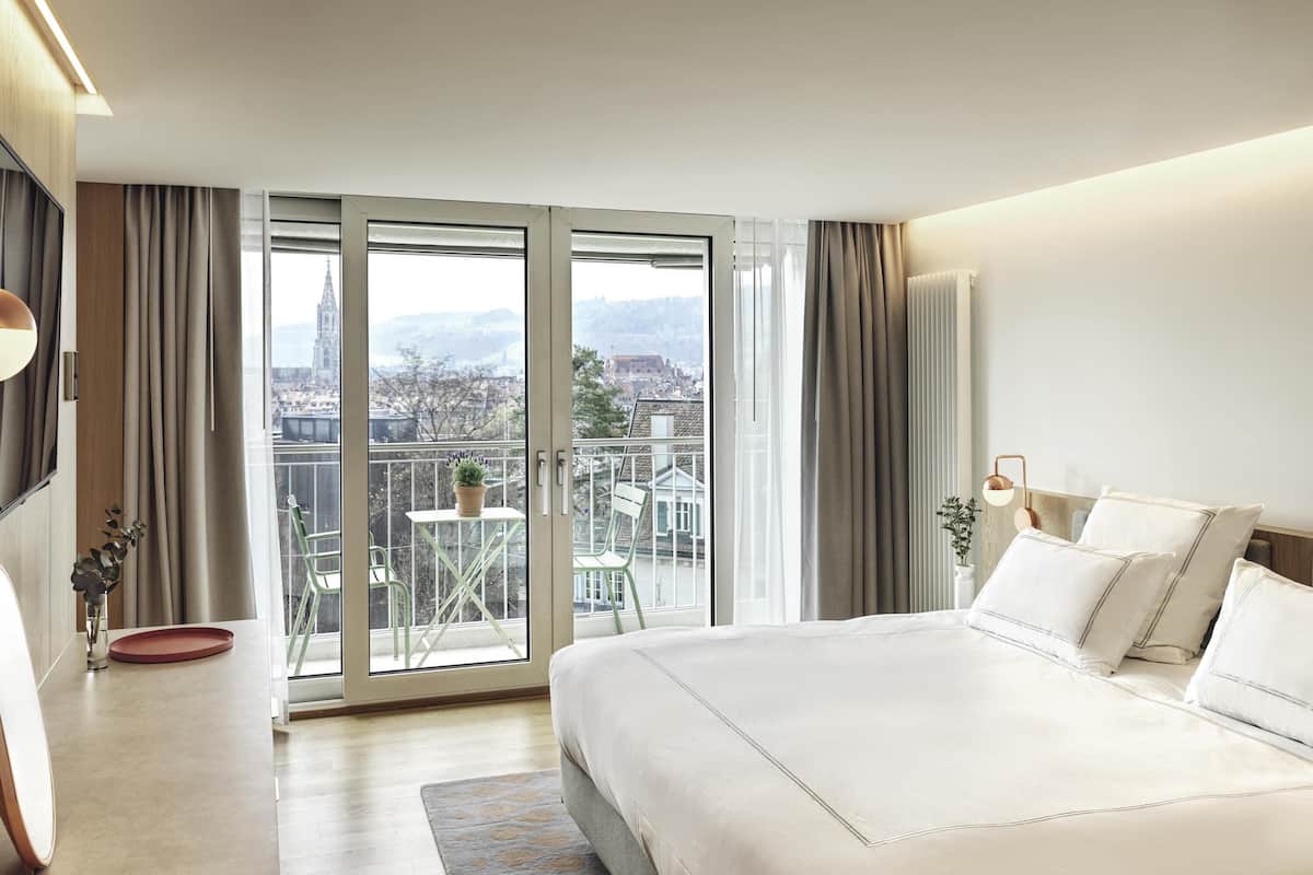 Suite, 1 King Bed, Balcony | Minibar, in-room safe, desk, rollaway beds