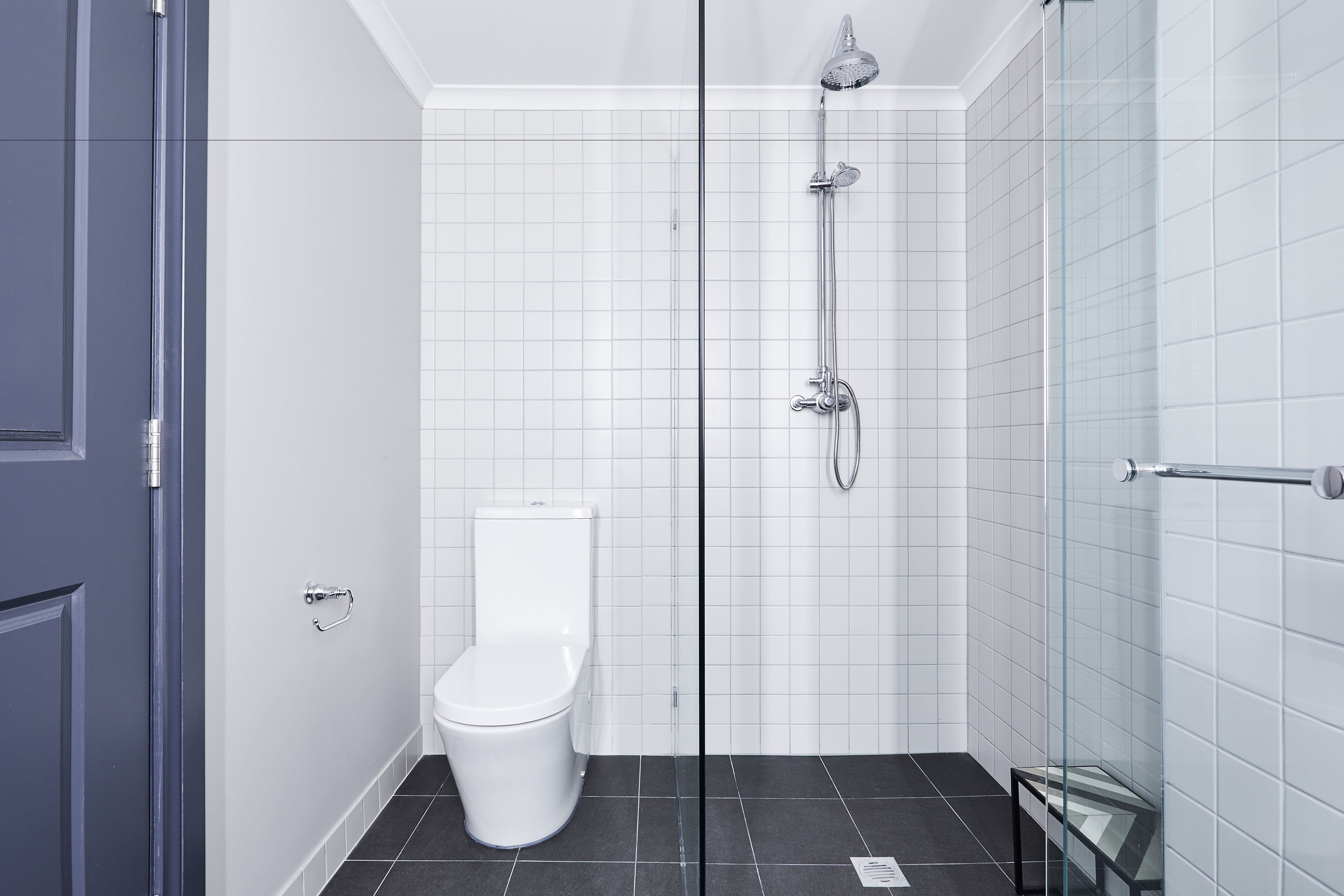 brassey family suite | bathroom | shower, free toiletries, hair dryer, slippers