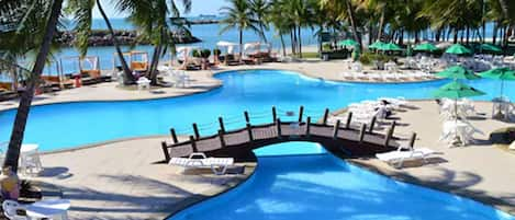 Outdoor pool, free pool cabanas, pool umbrellas