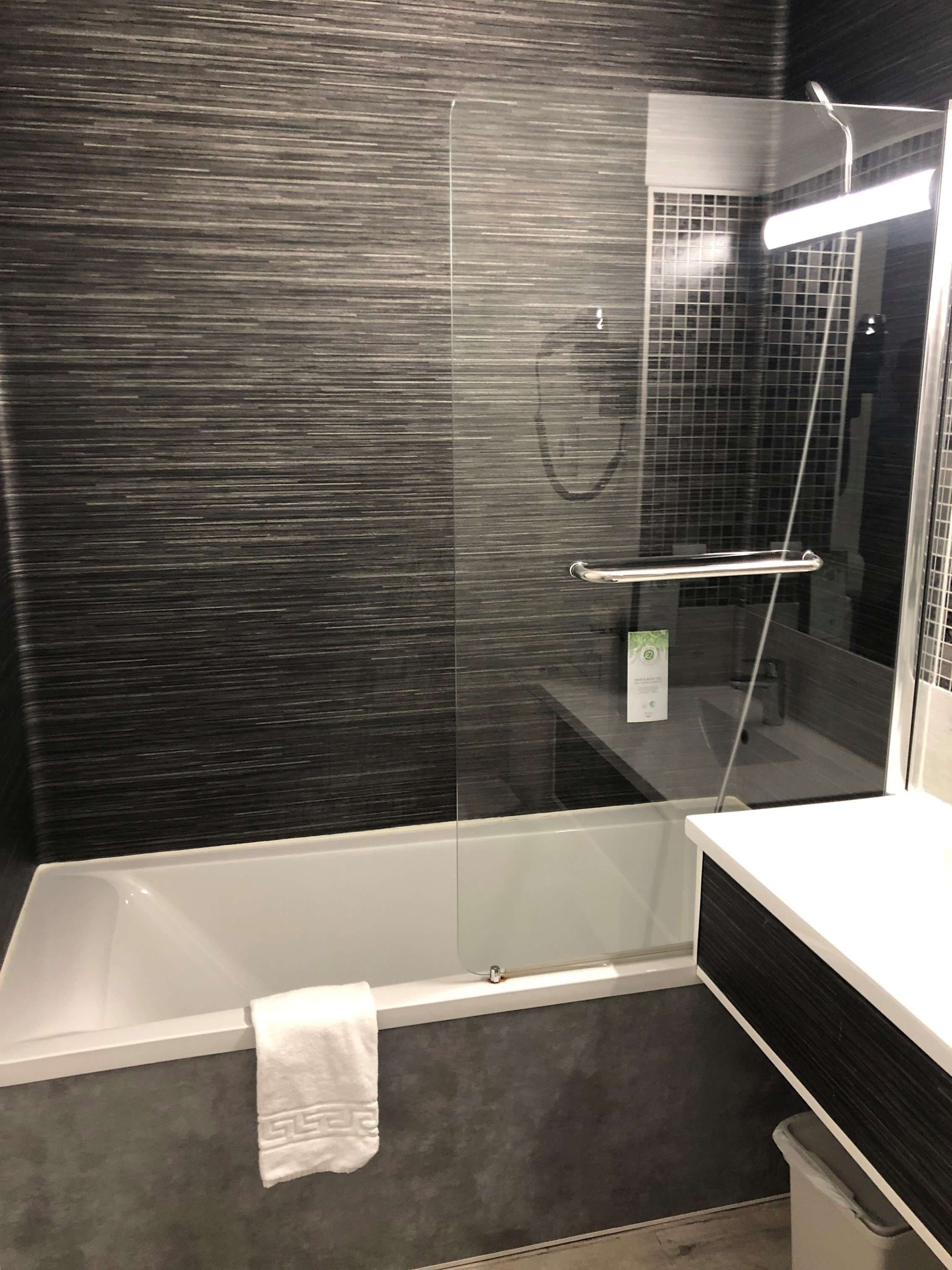 eco-friendly toiletries, hair dryer, towels