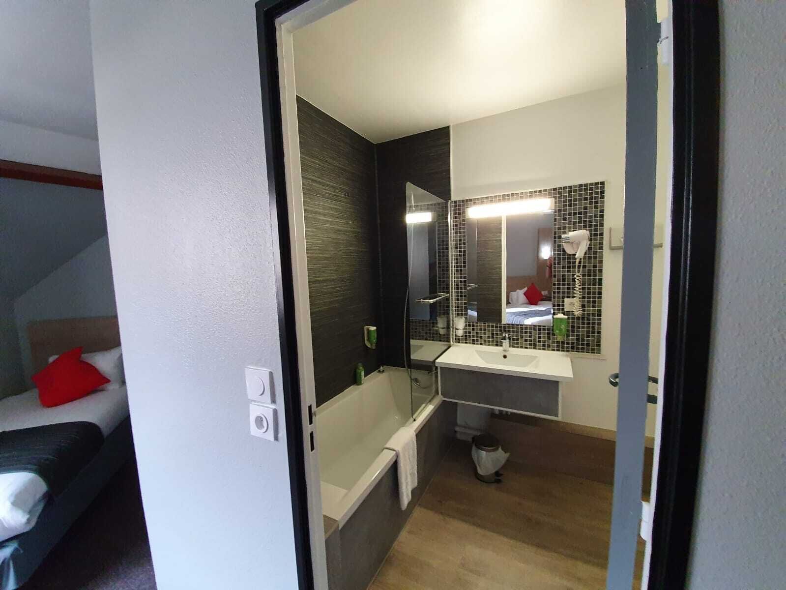 eco-friendly toiletries, hair dryer, towels