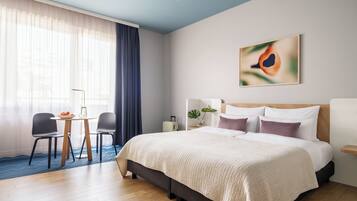 Medium Room with Balcony | Premium bedding, in-room safe, desk, laptop workspace