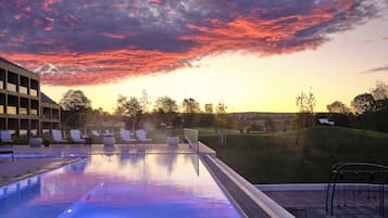 Indoor pool, outdoor pool, pool umbrellas, sun loungers