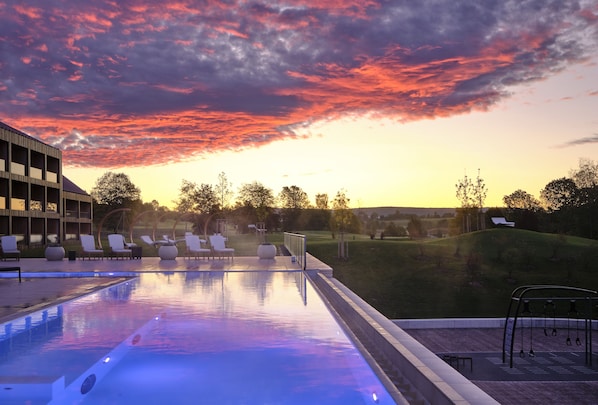 Indoor pool, outdoor pool, pool umbrellas, sun loungers