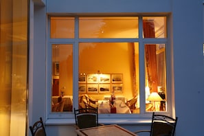 Breakfast, dinner served; local cuisine, garden views