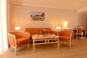 Junior Suite, 1 Double Bed | Living area | Flat-screen TV