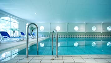 Indoor pool, open 8:00 AM to 9:00 PM, pool loungers
