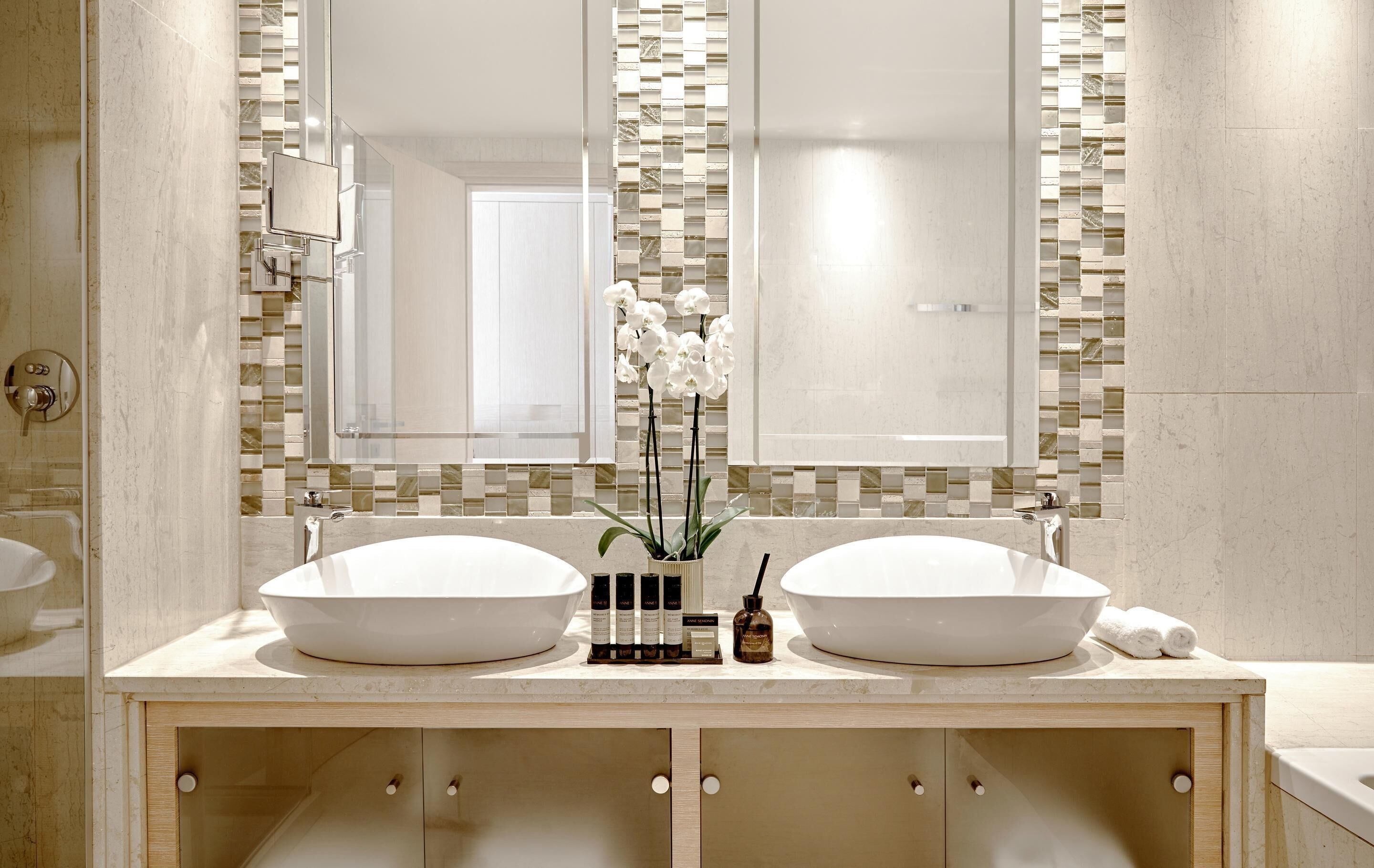 separate bathtub and shower, designer toiletries, hair dryer, bathrobes