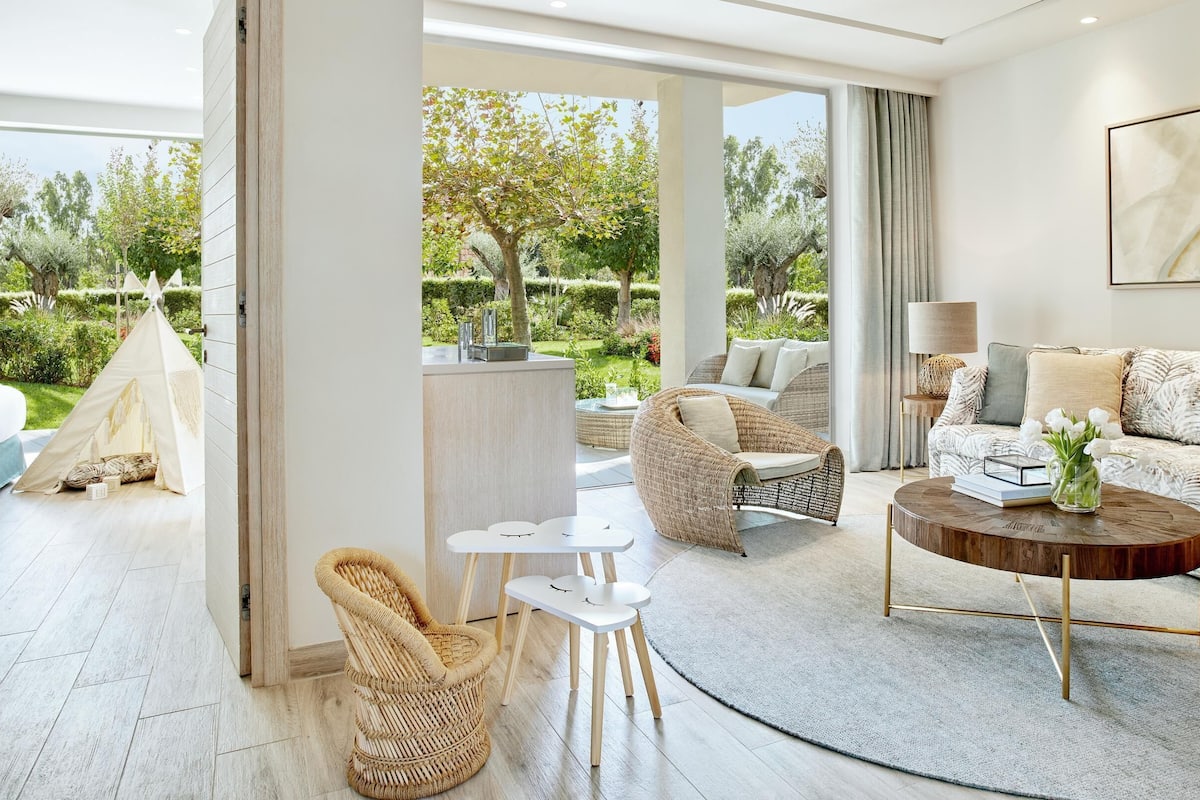Suite, 1 Bedroom, Garden View (Private Garden) | 1 bedroom, in-room safe, blackout drapes, free cribs/infant beds