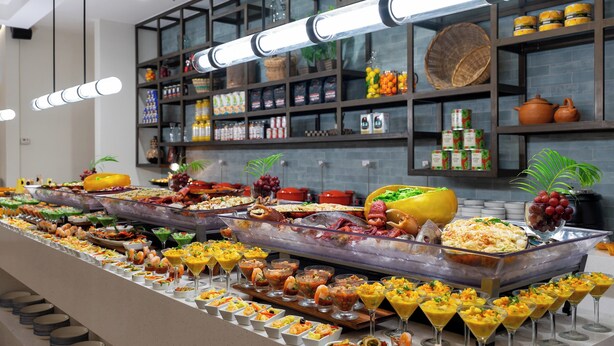 A buffet with various dishes and drinks, including seafood, salads, and desserts. - InterContinental Real San Pedro Sula by IHG (San Pedro Sula)