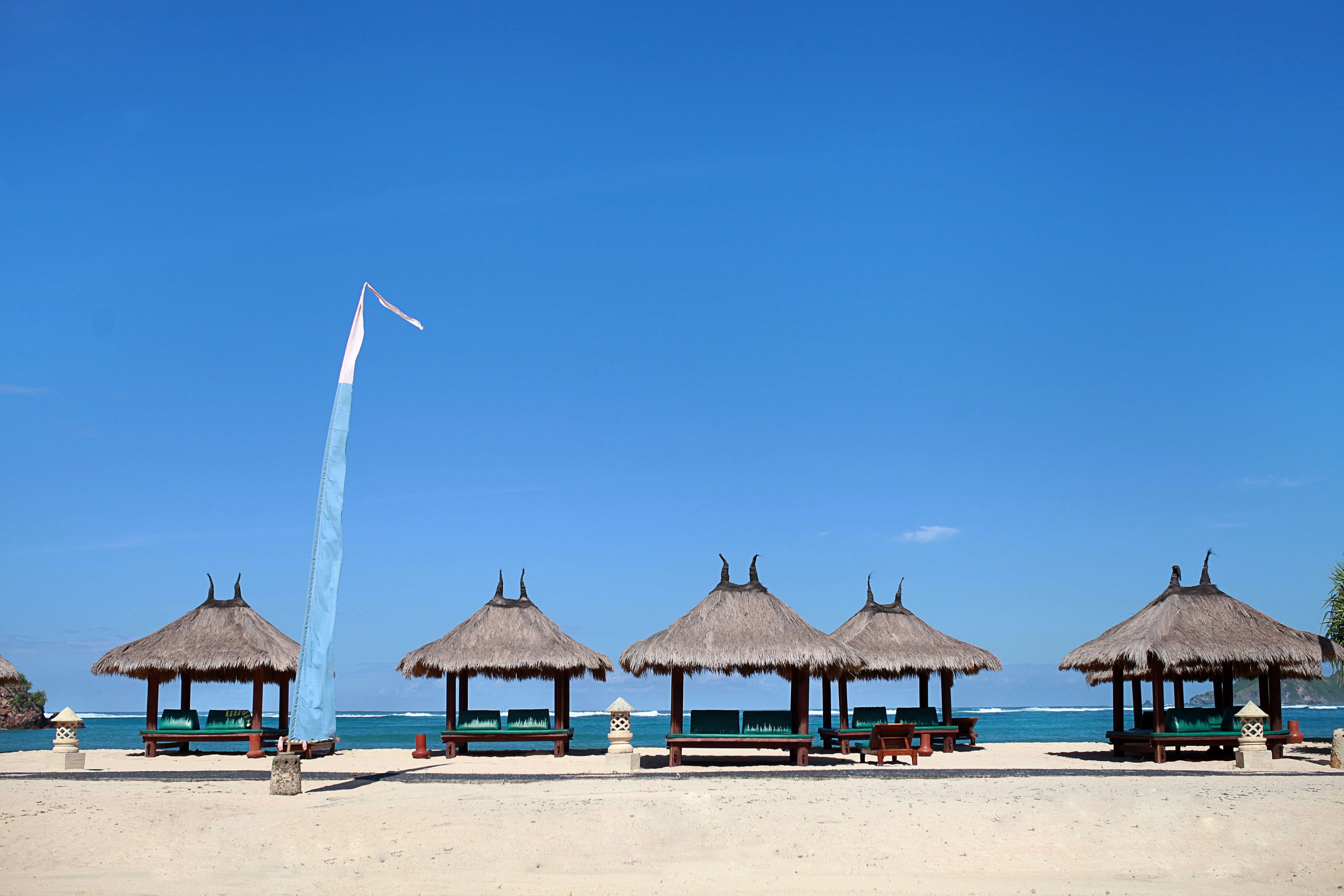 private beach, white sand, free beach cabanas, sun-loungers