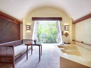 Eco-friendly toiletries, hair dryer, slippers, towels