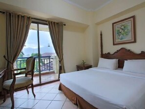 Suite ejecutiva | Caja de seguridad en la habitación, escritorio y camas extra 