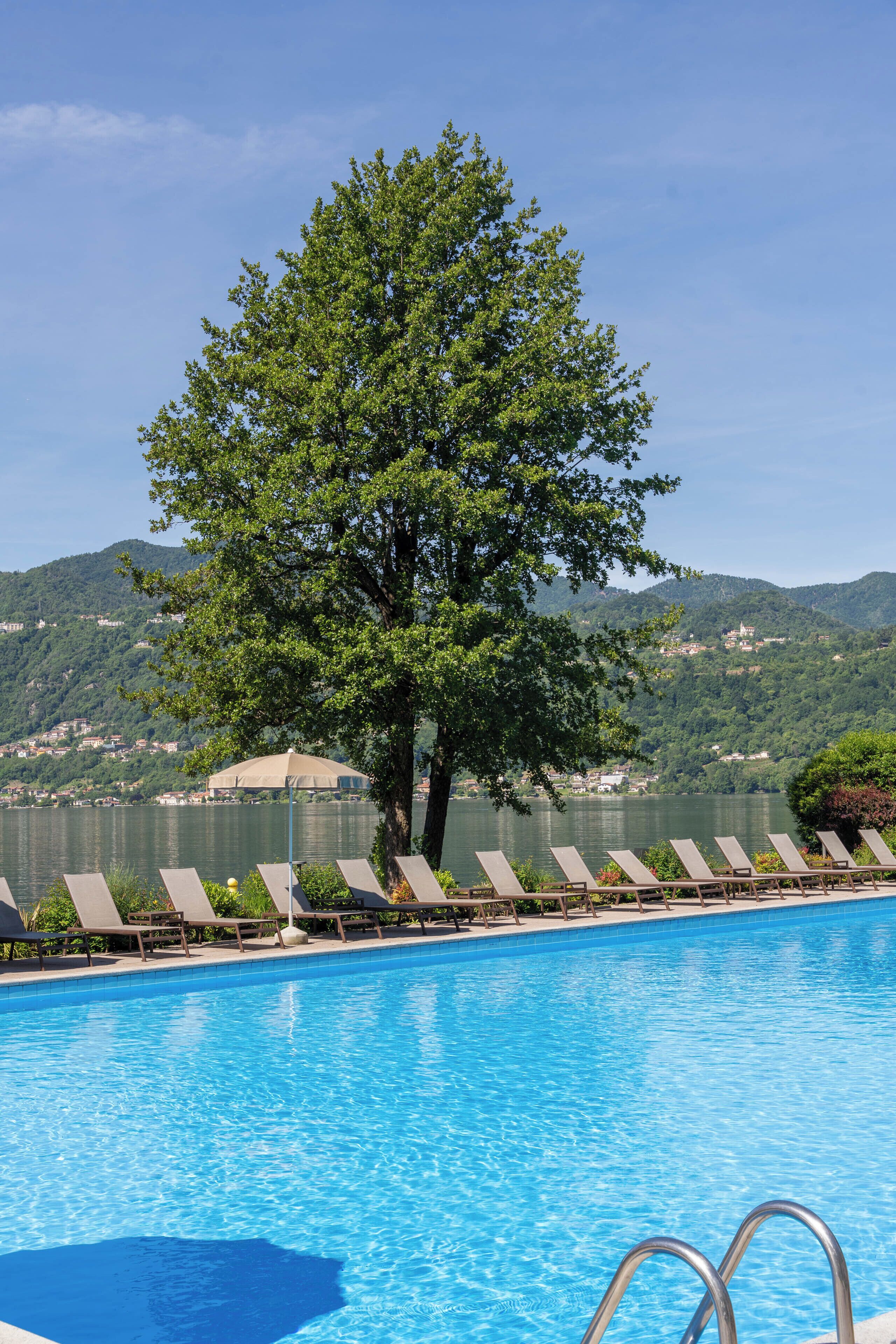 outdoor pool, open 9:30 am to 7 pm, pool loungers