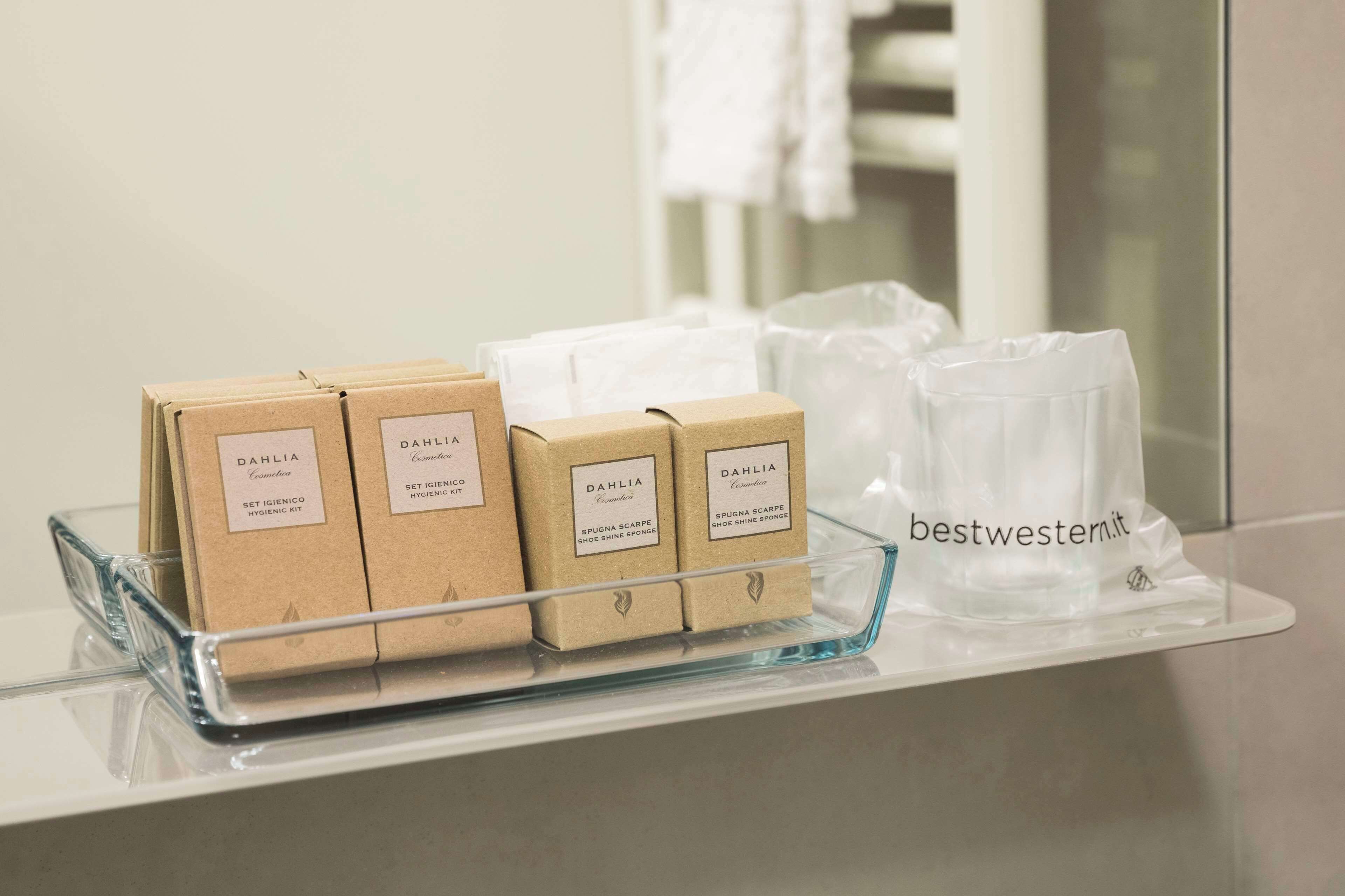 eco-friendly toiletries, hair dryer, slippers, towels