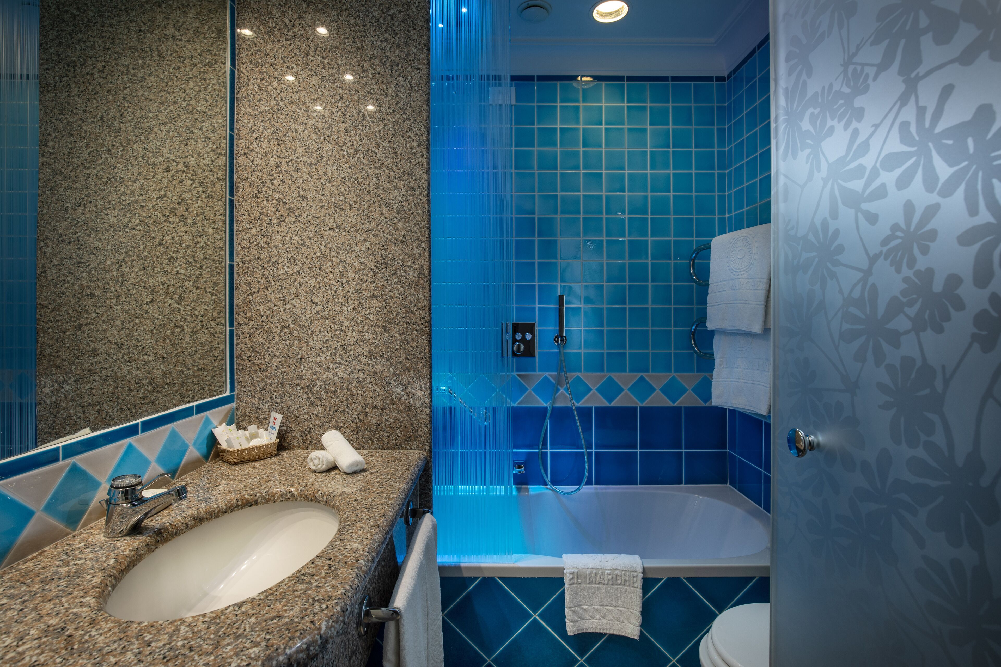 combined shower/bathtub, free toiletries, hair dryer, bathrobes