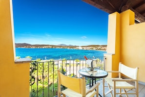 Junior Suite, 1 Bedroom, Sea View | Minibar, in-room safe, desk, blackout drapes