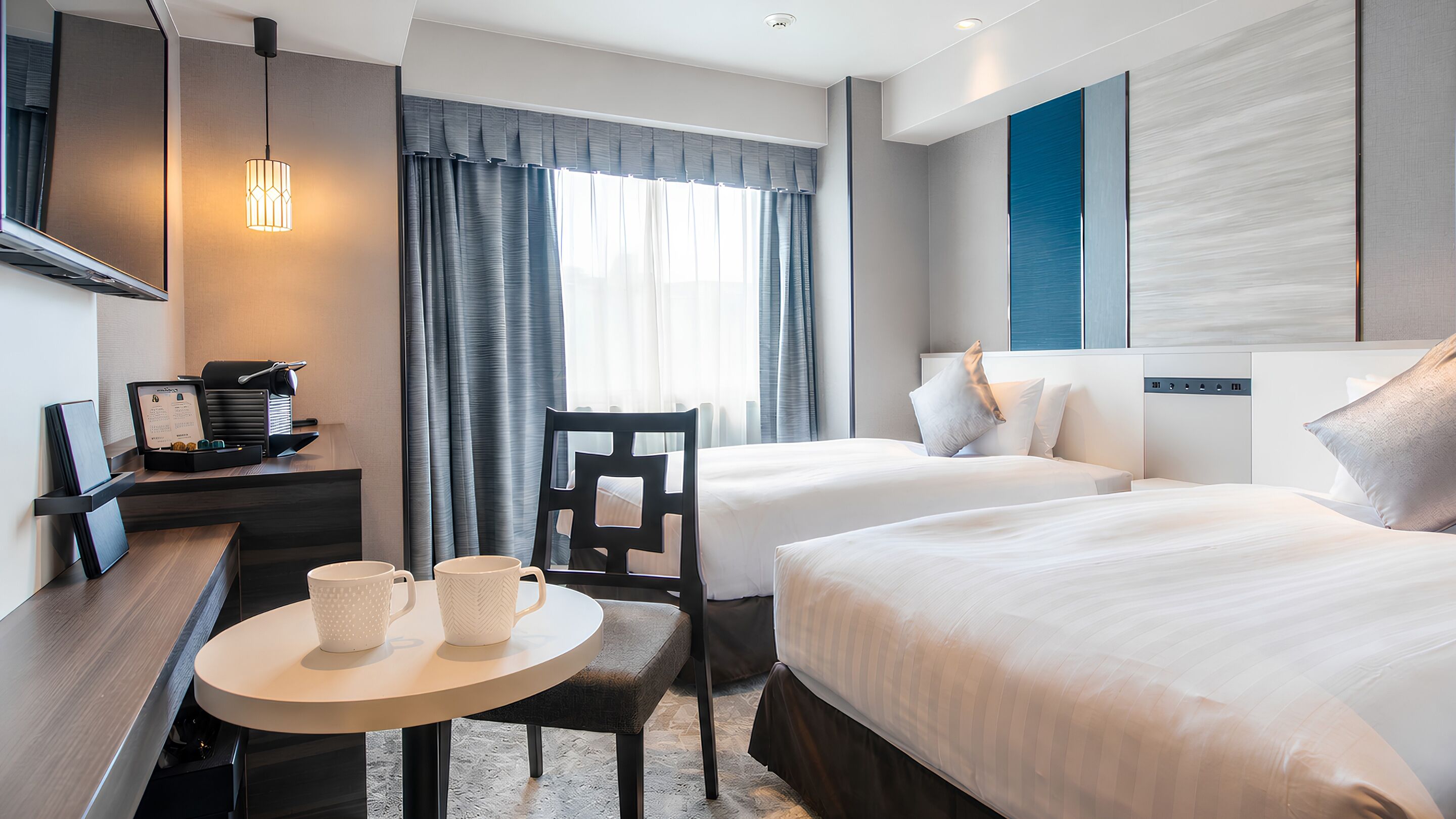 Renovation Twin Room, Non-Smoking | In-room safe, desk, laptop workspace, free WiFi