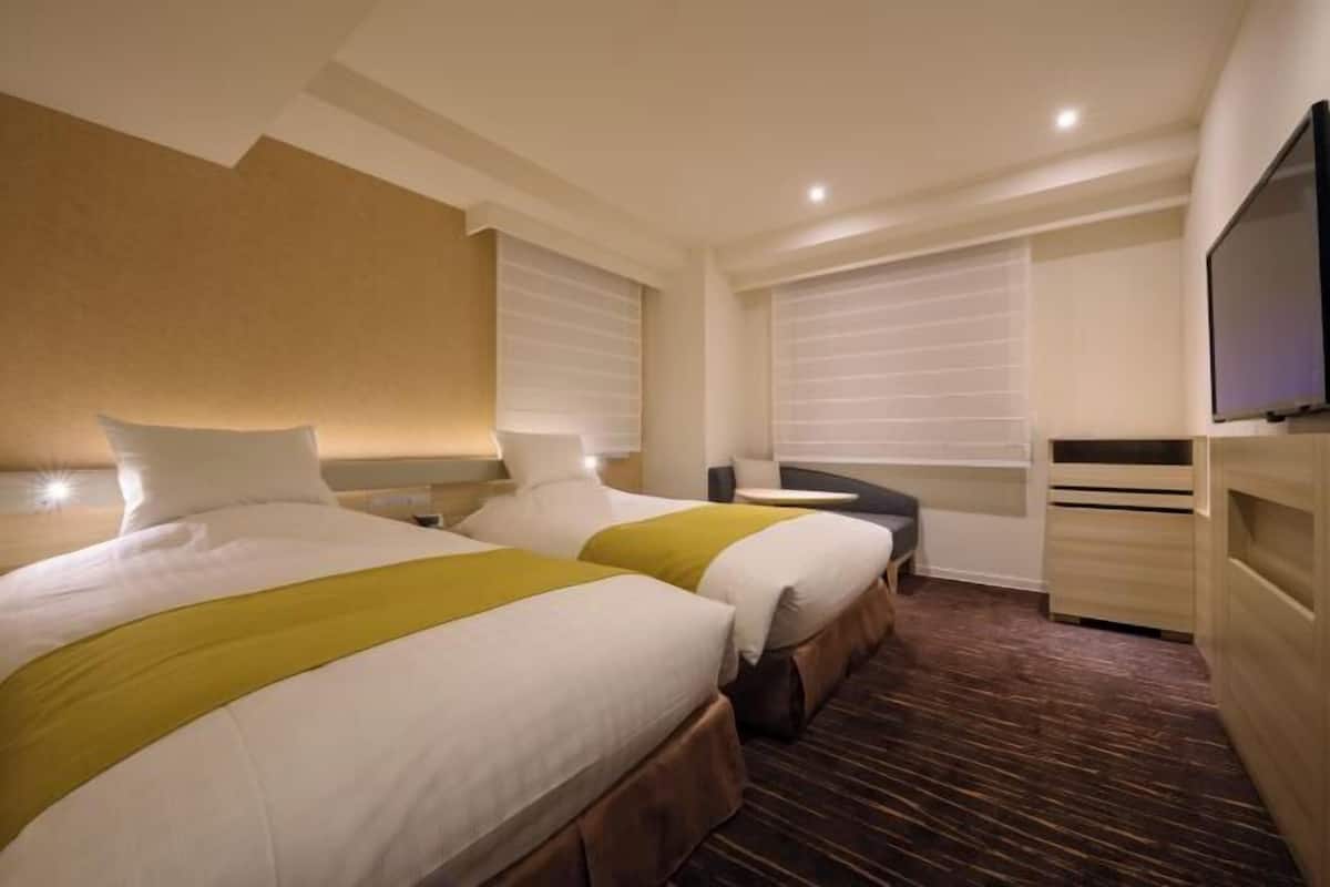 Ropa de cama de alta calidad, edredón y minibar