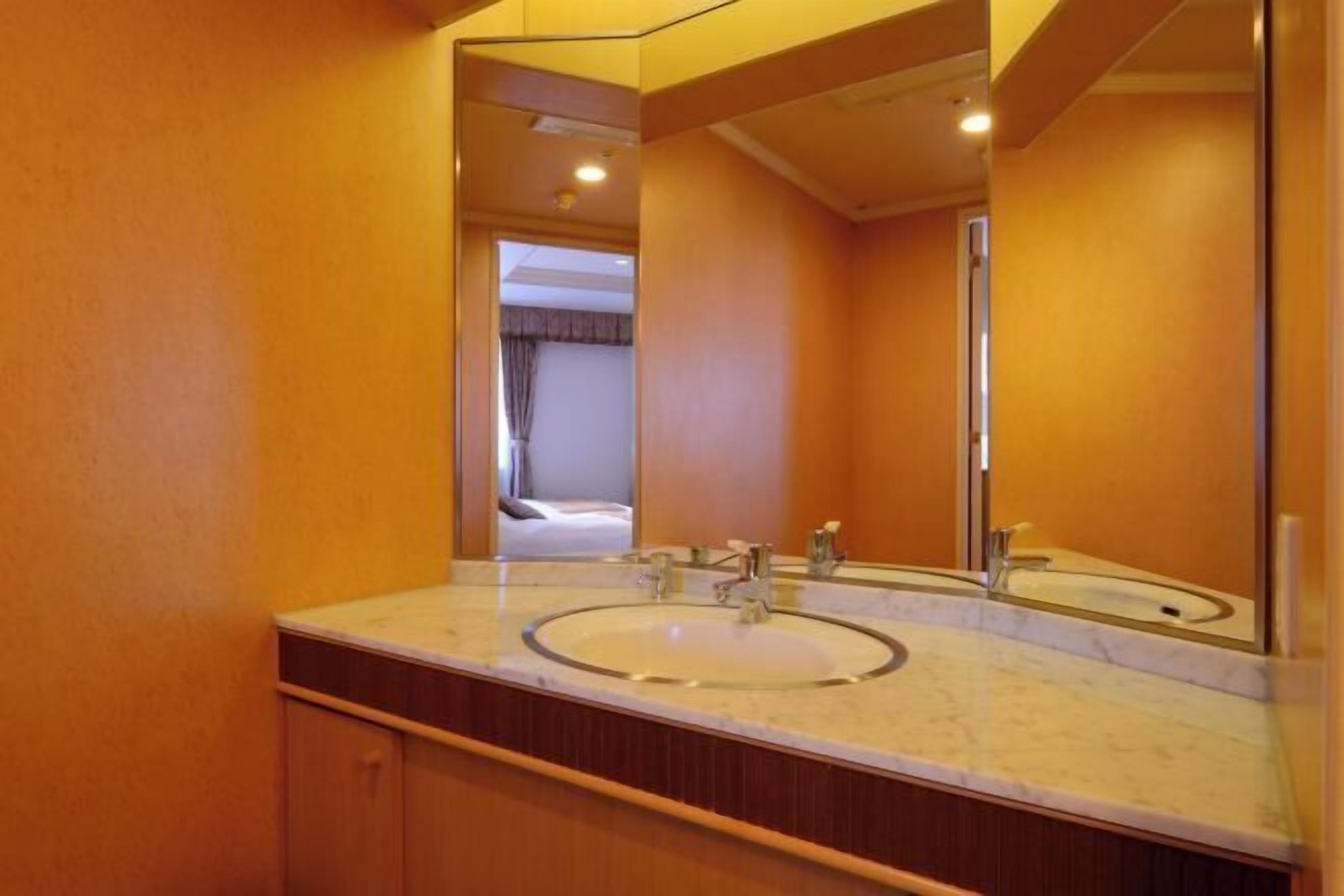 Bathroom | Shower, free toiletries, hair dryer, slippers