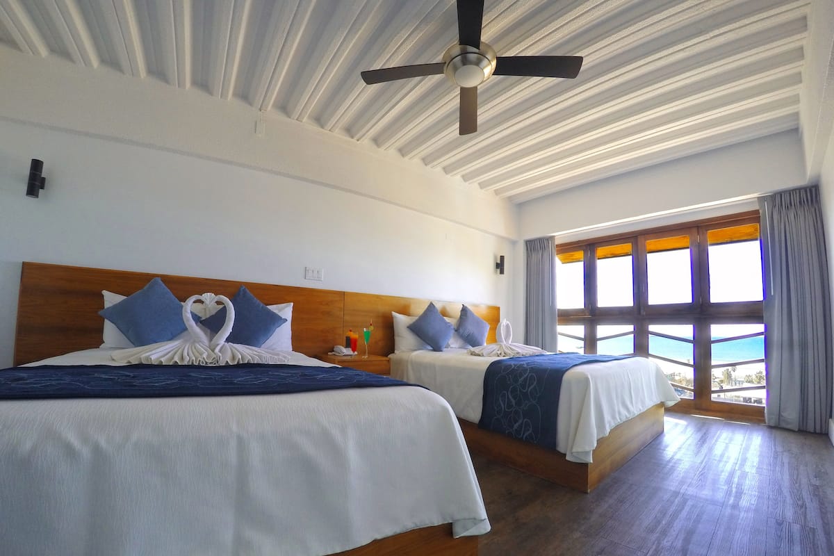 Double Room, Ocean View | 1 bedroom, individually decorated, bed sheets