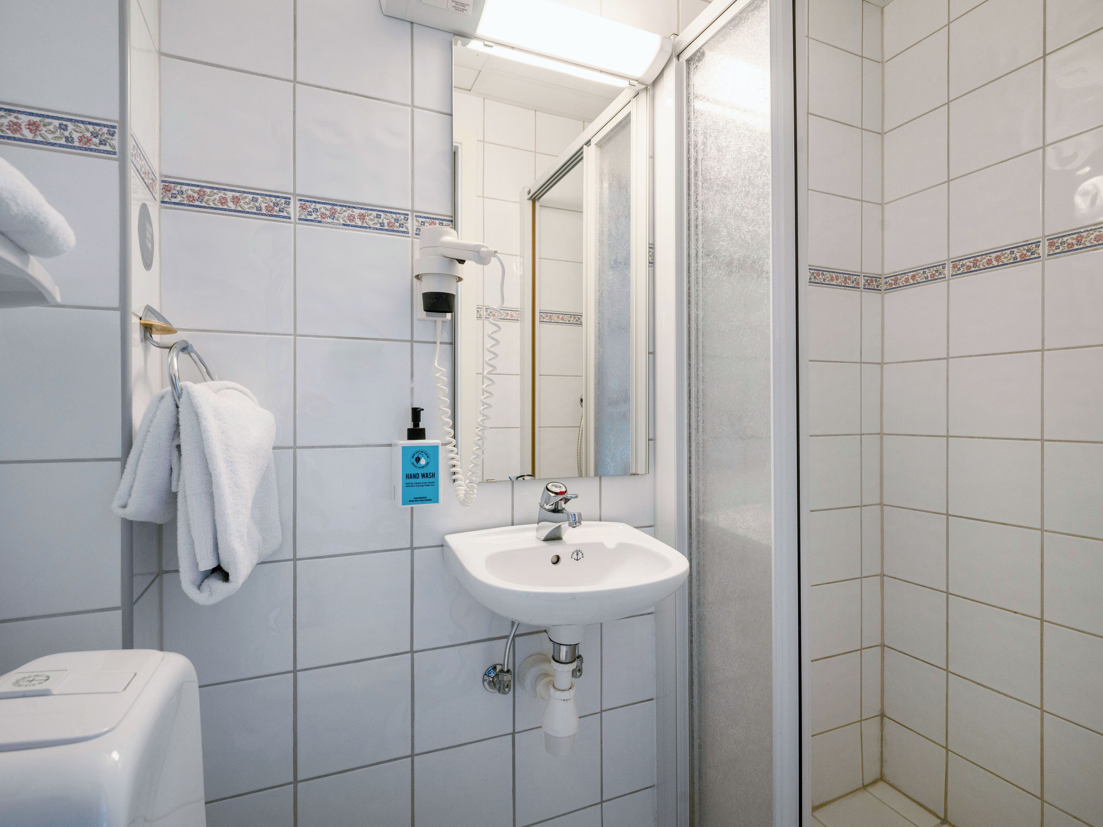 single room (compact) | bathroom | hair dryer, towels