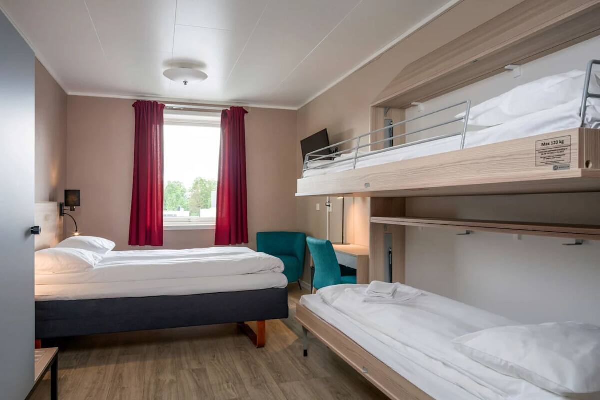 Desk, blackout curtains, iron/ironing board (on request), free WiFi