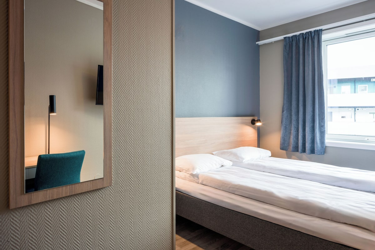 individually decorated, individually furnished, desk, blackout curtains