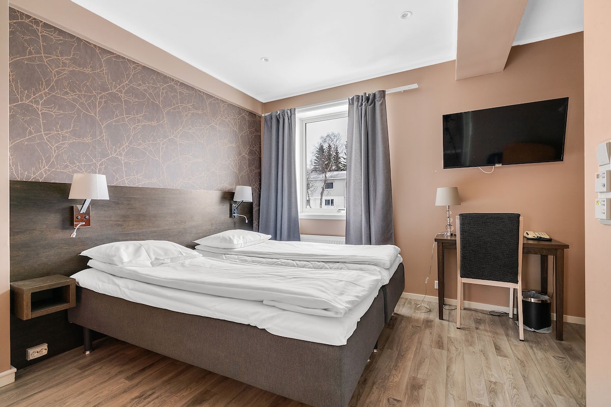 individually decorated, individually furnished, desk, blackout curtains