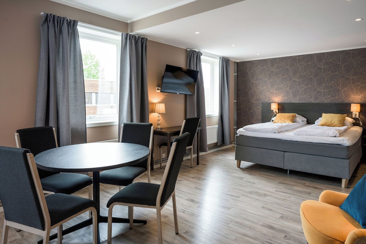 individually decorated, individually furnished, desk, blackout curtains