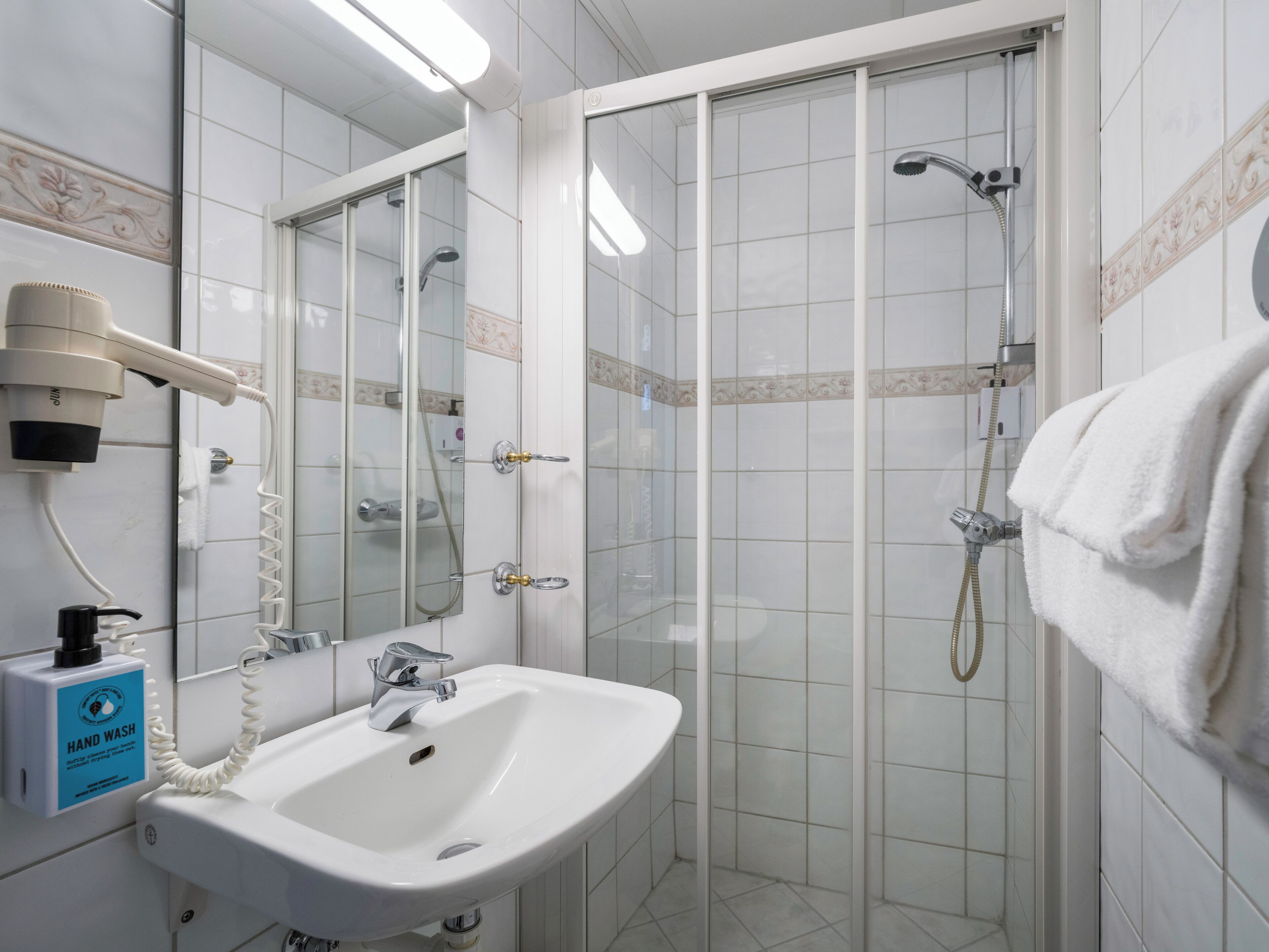 standard room | bathroom | hair dryer, towels