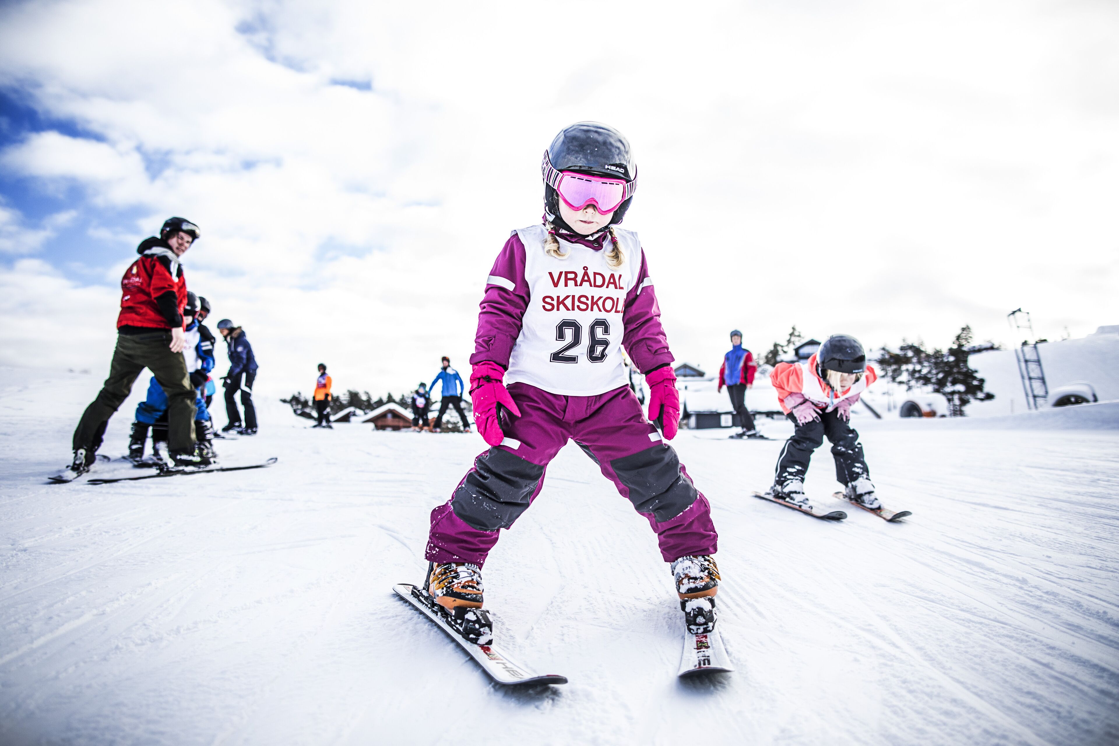 A person skiing on a snowy slope.