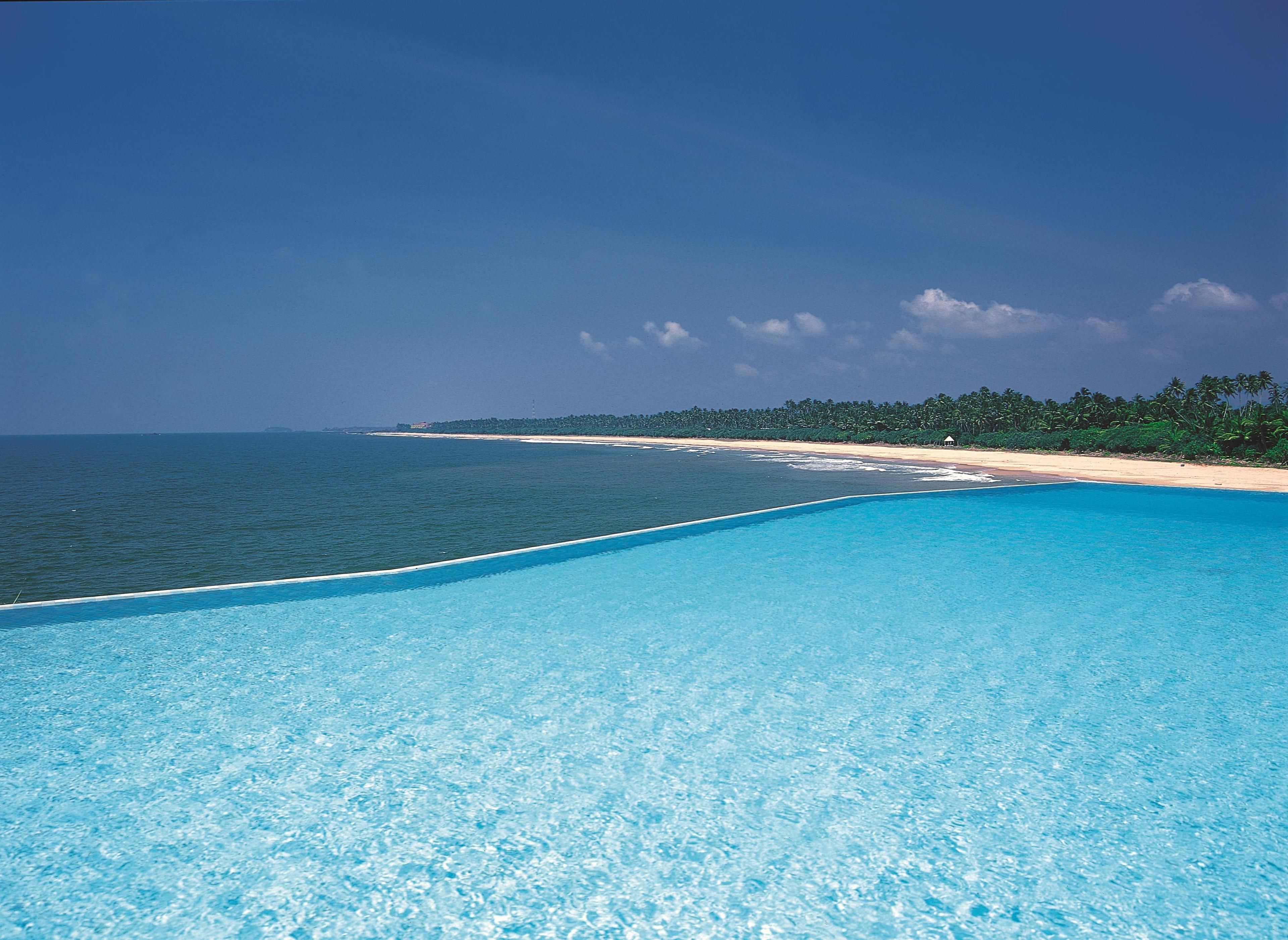 Outdoor pool, open 7:30 AM to 7:00 PM, pool umbrellas, sun loungers