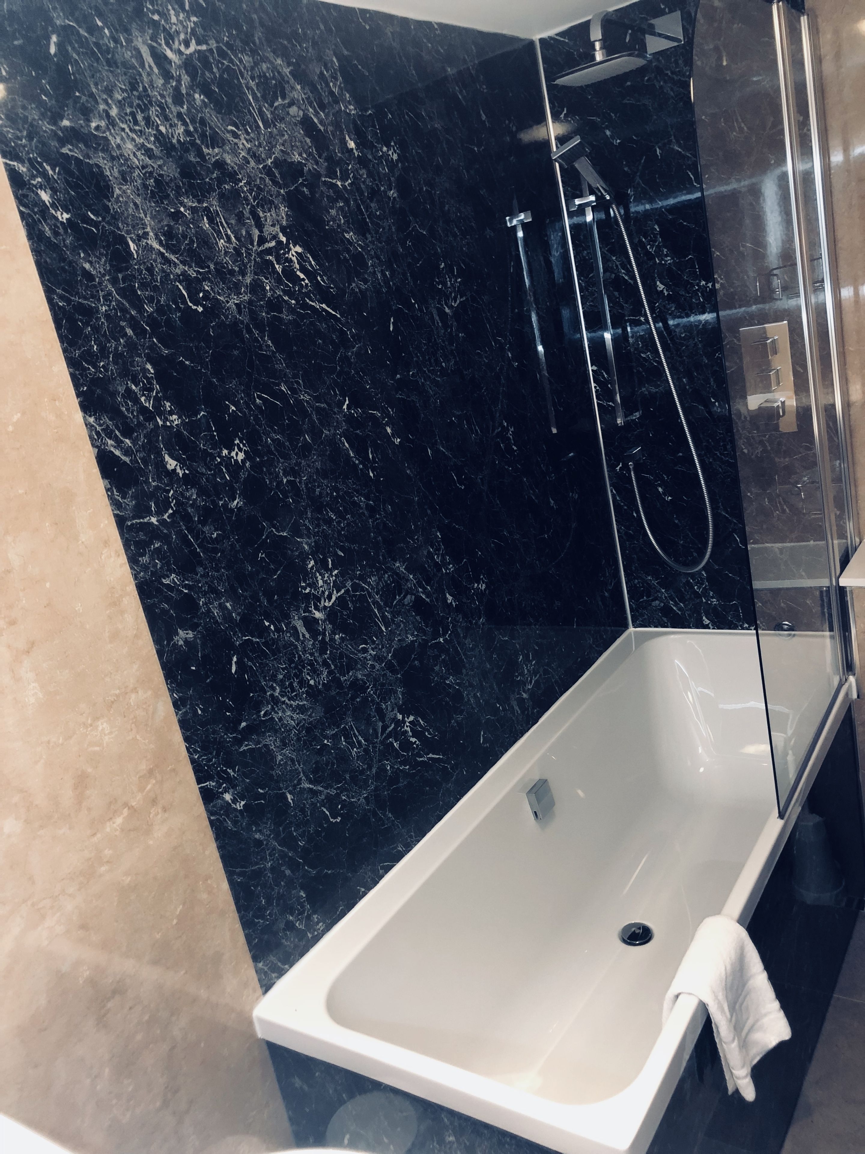 combined shower/bathtub, free toiletries, hair dryer, towels