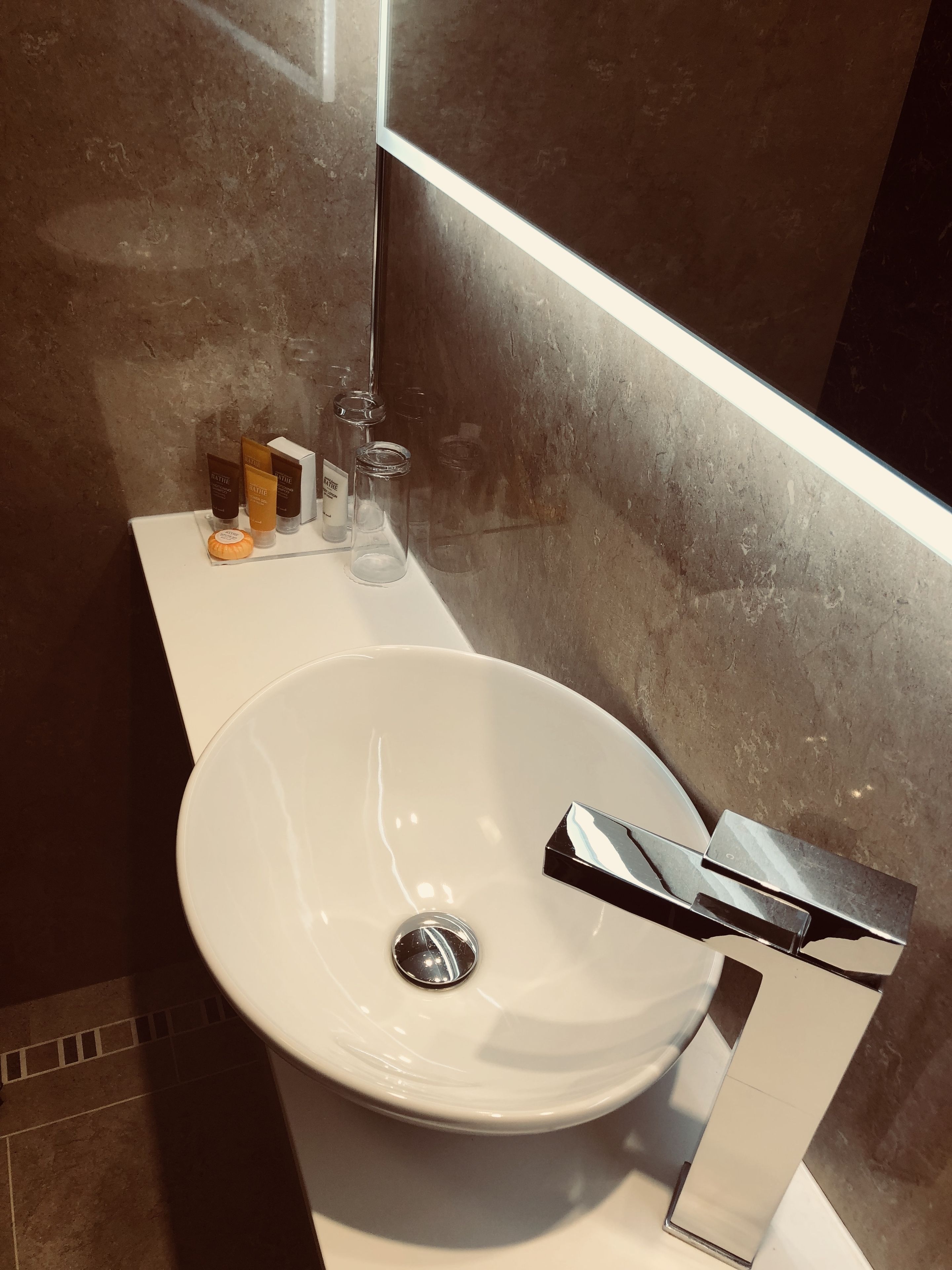 combined shower/bathtub, free toiletries, hair dryer, towels