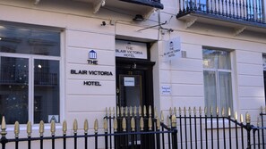 The facade of The Blair Victoria Hotel with a sign indicating vacancies. - The Blair Victoria Hotel (London)