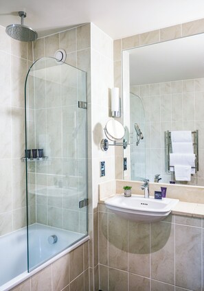 Designer toiletries, hair dryer, bathrobes, slippers