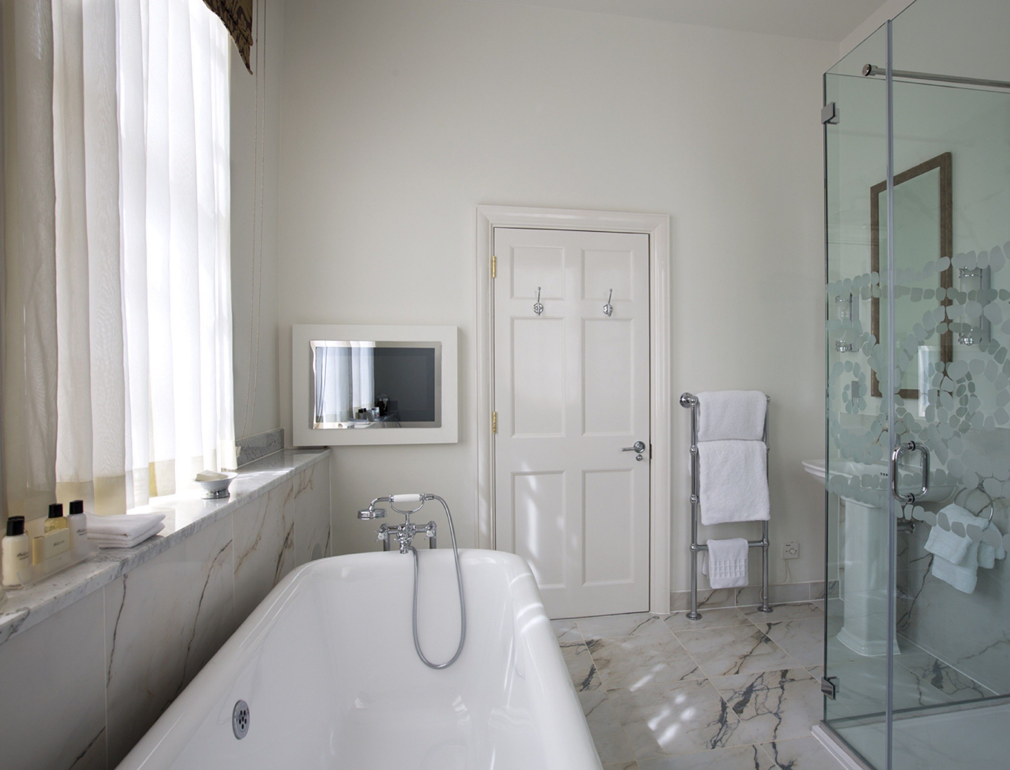 feature king bedded room in historic mansion house | bathroom | designer toiletries, hair dryer, bathrobes, slippers