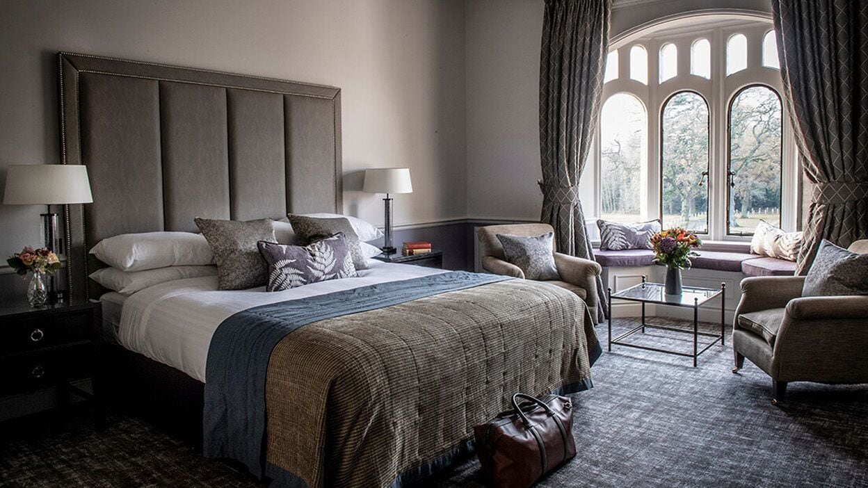 feature room | 1 bedroom, premium bedding, minibar, in-room safe