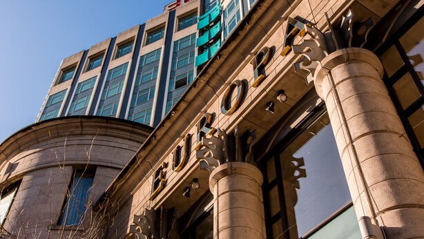 A building with the word "EURO" on the facade, suggesting it is a hotel or similar establishment. - Europa Hotel (Belfast)